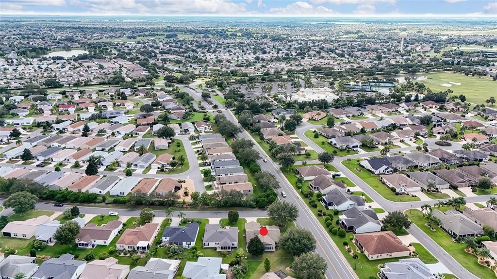 AERIAL - Looking Southeast - showing the close proximity to the popular SeaBreeze Recreation Center and Pool (center right) and Buena Vista Blvd. (center throughout)