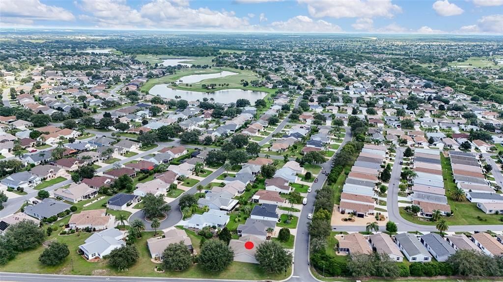 AERIAL - Looking Northeast - featuring Bluffton Road (center), Cane Garden Championship GC (mid center), and Bogart Executive GC (deep right)