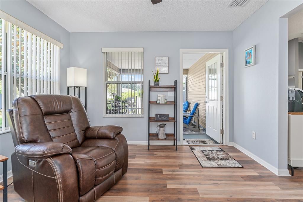 Another view of FLORIDA ROOM shows doorway to SCREEN ENCLOSED LANAI.