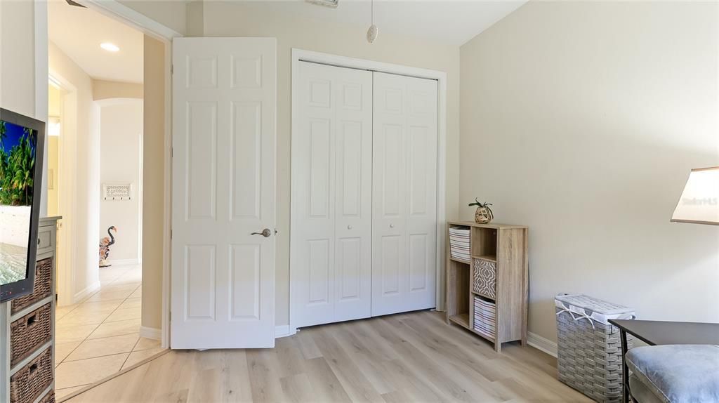 Third Bedroom with large window, ceiling Fan and large built in closet. Next to Second Full Bathroom.