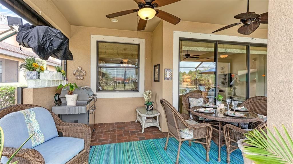 arge Lanai plumbed for a outdoor kitchen with Natural Gas, Electric and Water and 3 Large outdoor Lanai Fans.