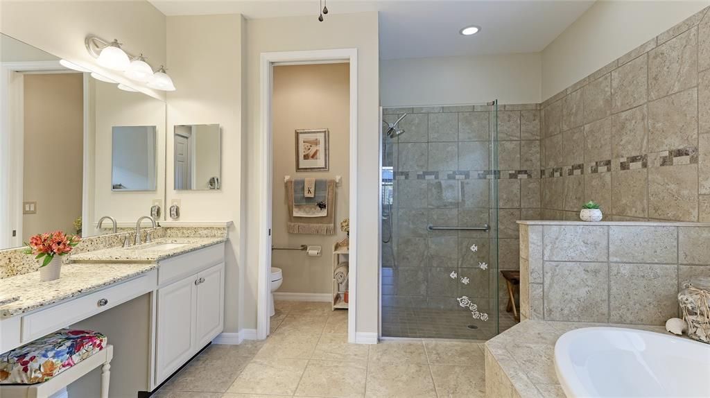 Ensuite Primary Bathroom with soaking tub and walk in shower.