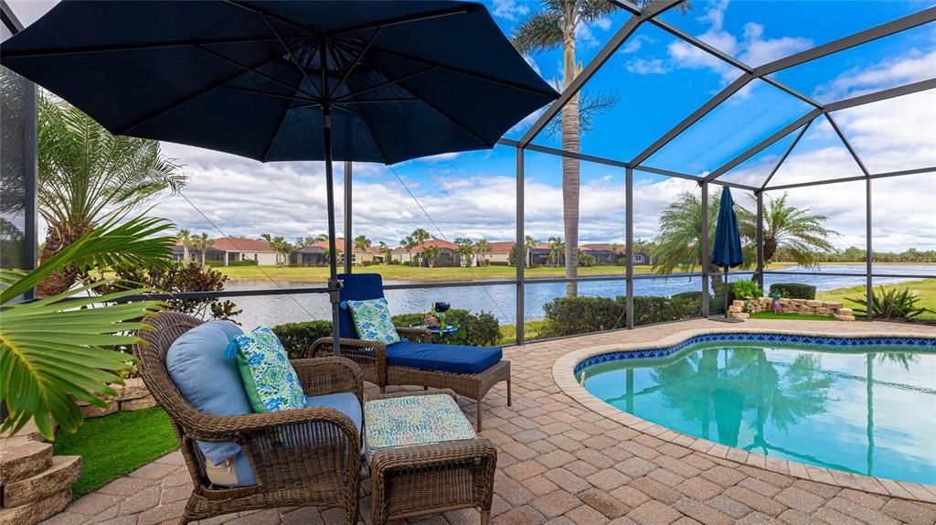 Large Lanai allowing for additional big umbrellas for shade on those sunny FL days.