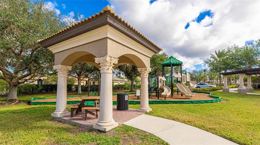 Playground for residents and guests to play and watch and wait under the pavilion.