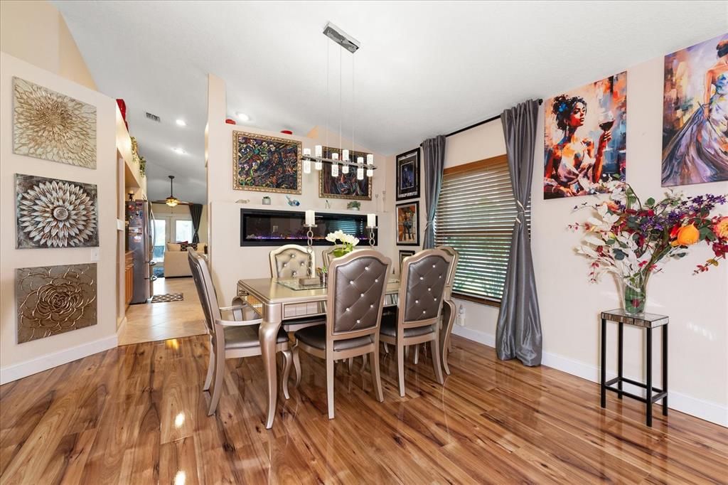 Dining Room with Mid Wall Electric Fireplace