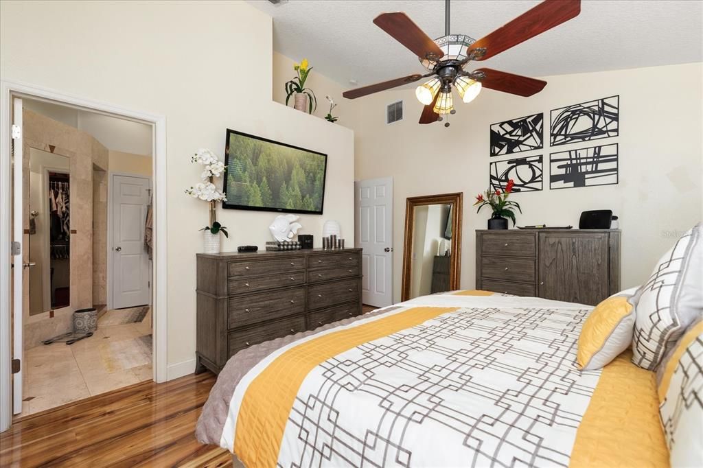 Primary bedroom with Fan and ensuite Bath