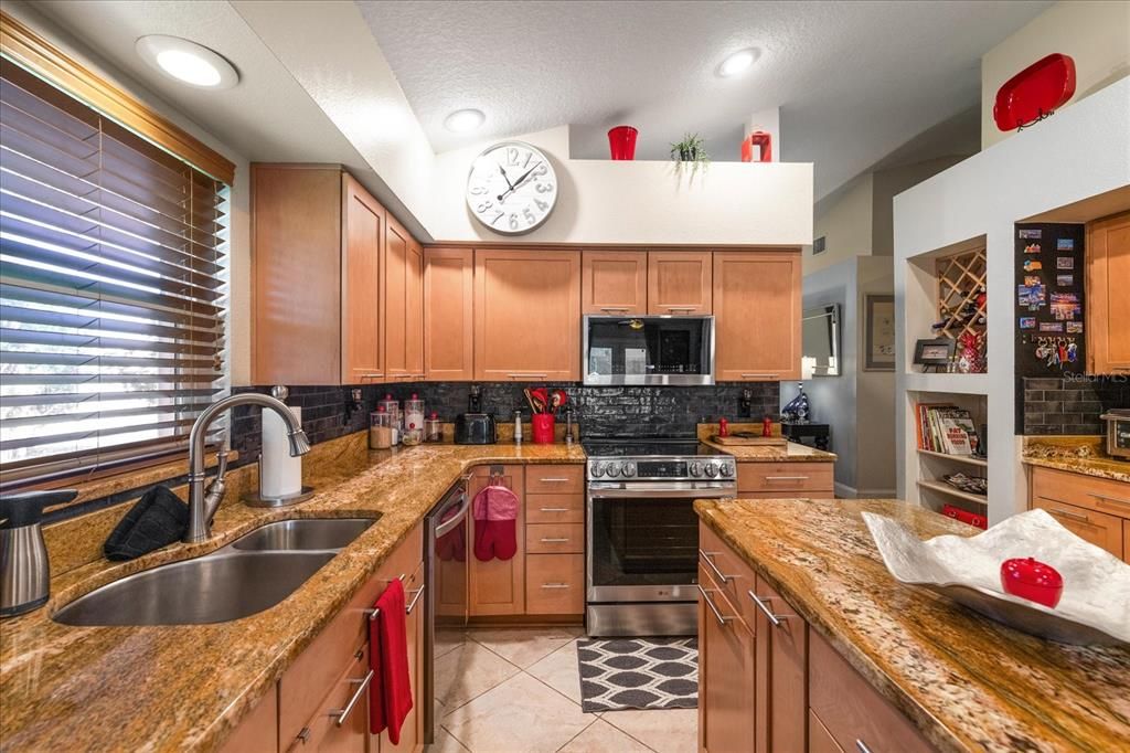 Wood Shaker Cabinets, Soft Close drawers with Granite Counters, Built in Wine Rack