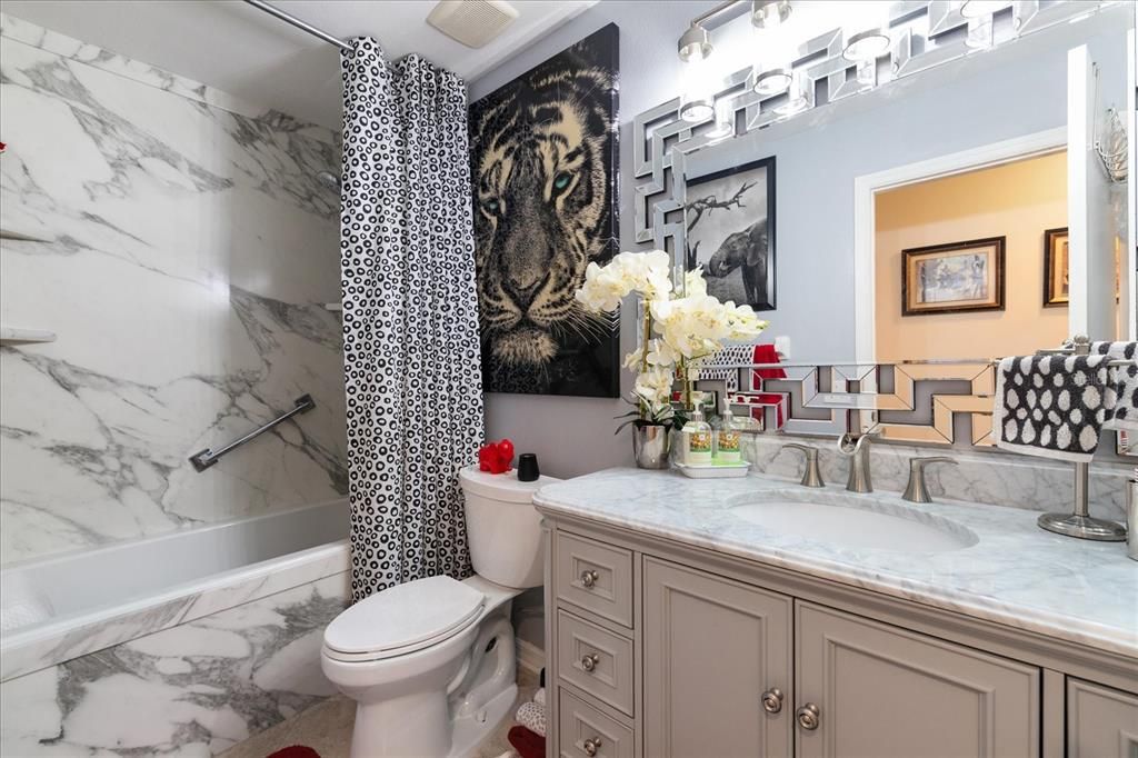 Guest Bath with a Soaker Tub Shower Combo, Soft Close Drawers