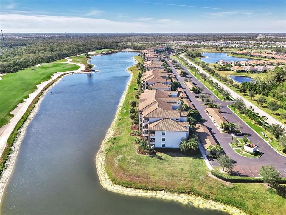 AERIAL VIEW OF LARGE LAKE IN REAR OF CONDO