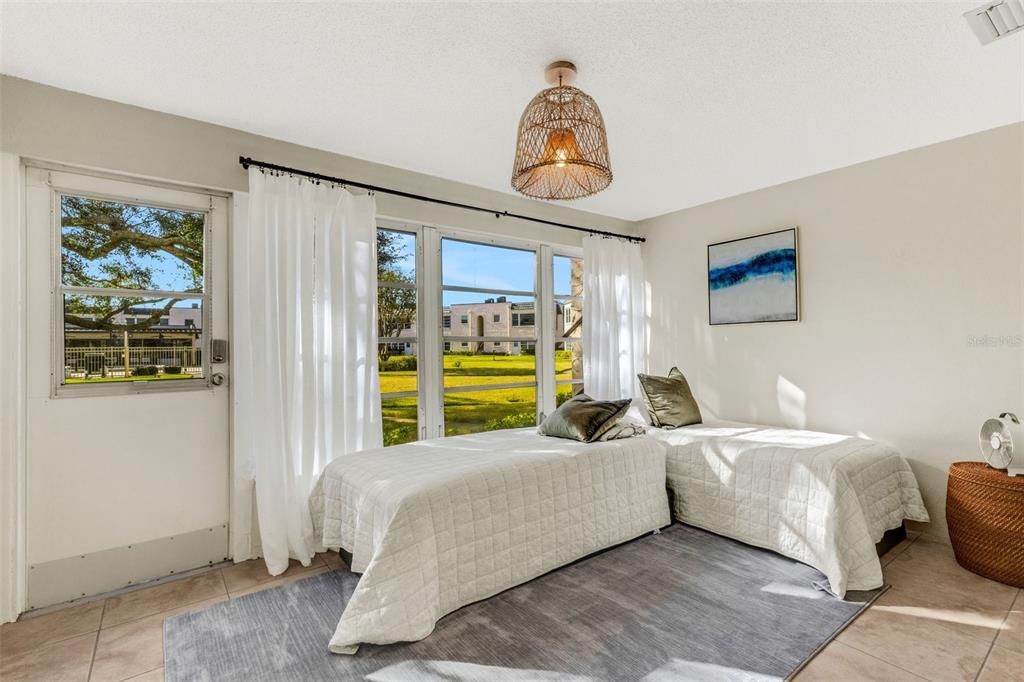 Florida Room With Pedestrian Door to Pool and Clubhouse