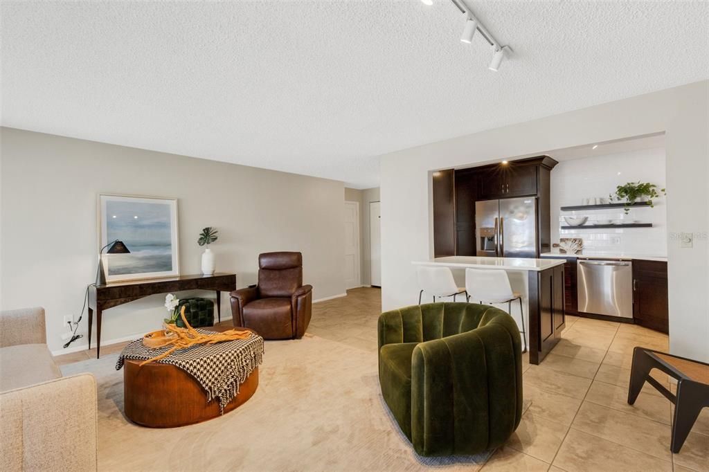 Living Room Open to Kitchen With Breakfast Bar