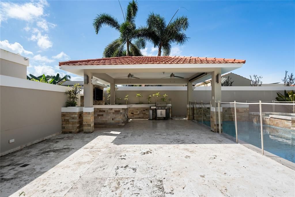 Second Covered Terrace/Gazebo complete with wet bar (sink, refrigerator, grill, and TV)