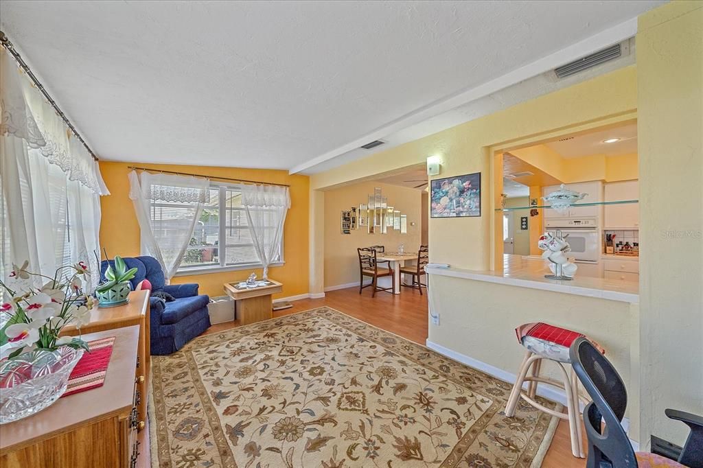 Sun room to dining area with kitchen window