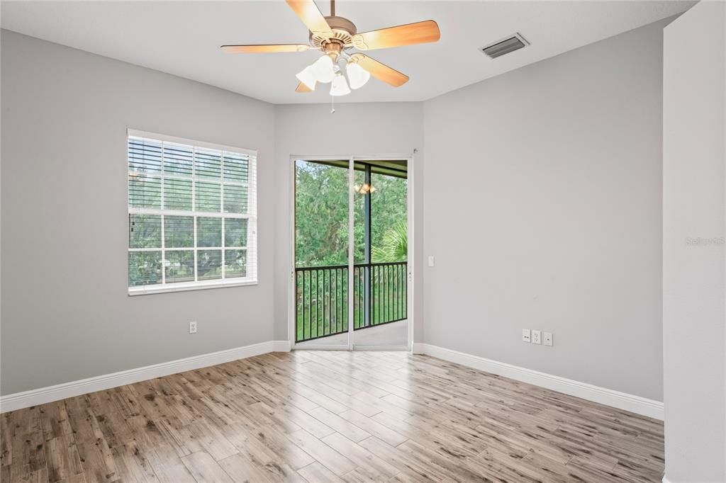 Primary Bedroom w. access to balcony