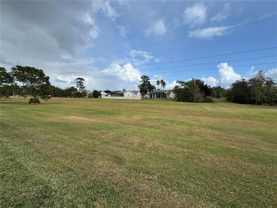 Open Field on Side of House