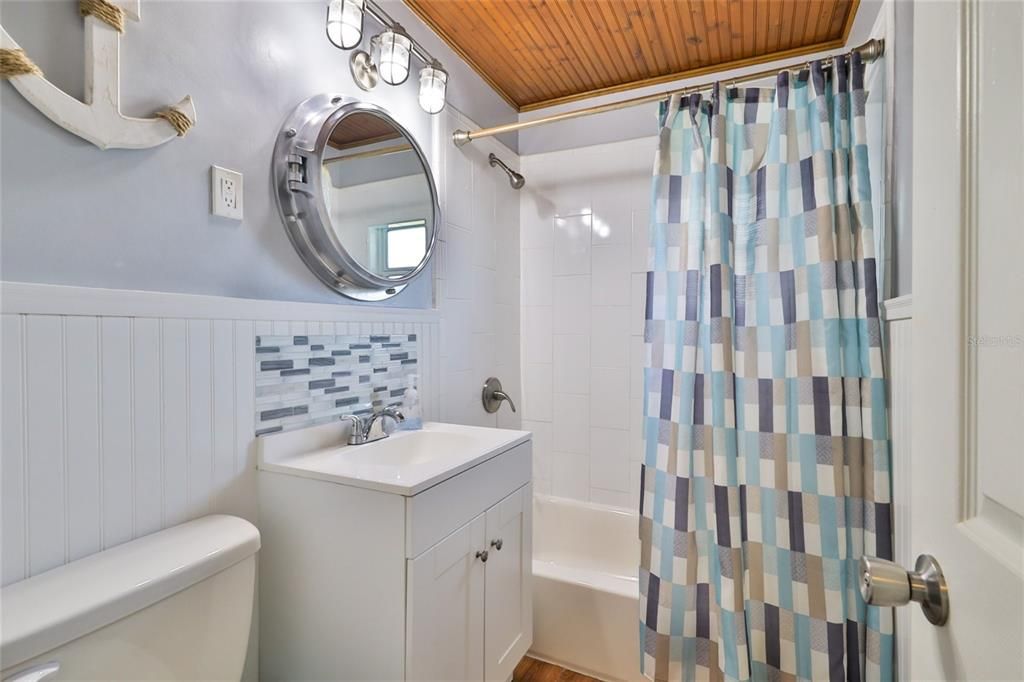 Master Bathroom with a tub and shower combo