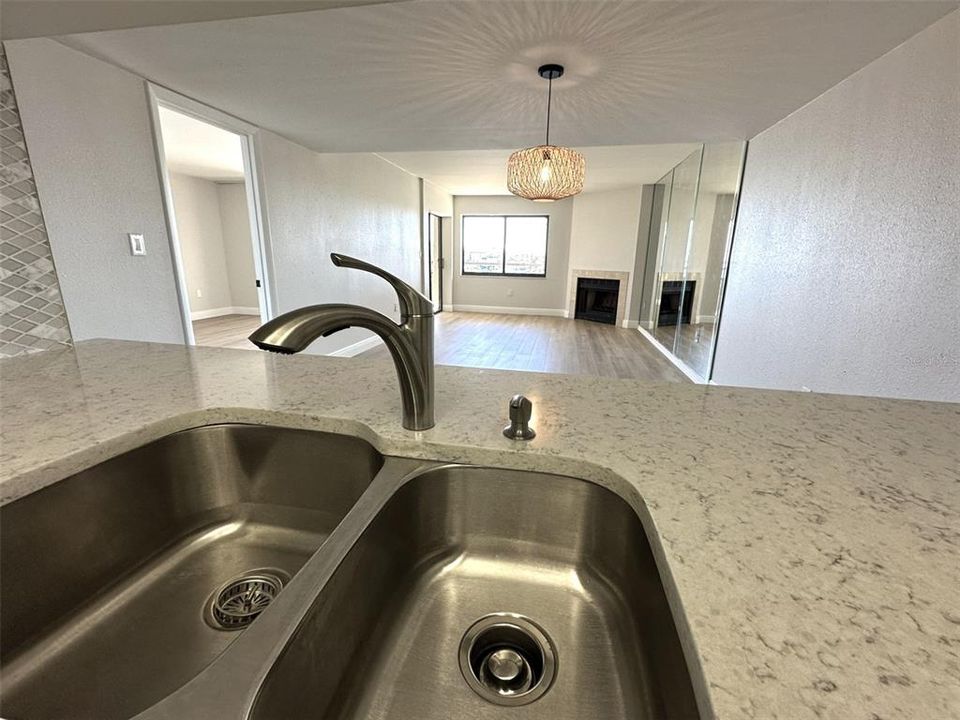 Kitchen looking out to dining/living areas