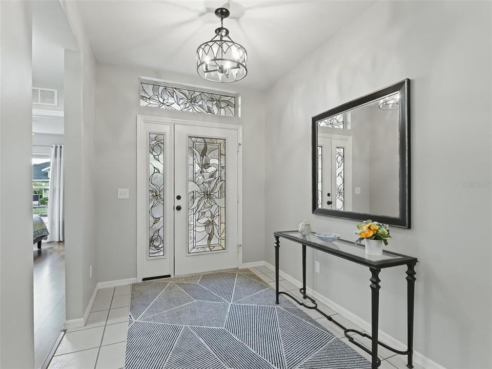 Foyer w/Designer light fixture & Tile floor