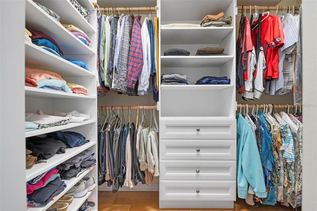 Primary bedroom walk-in closet