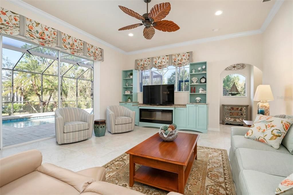 Family room with slider to lanai/pool