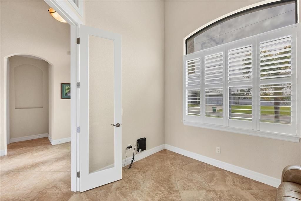 Den with French Doors and Plantation Shutters