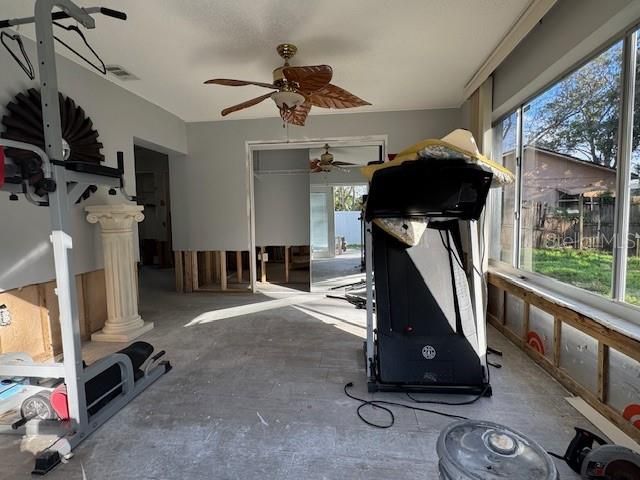 Family room or third bedroom if converted. Already has a closet in place.