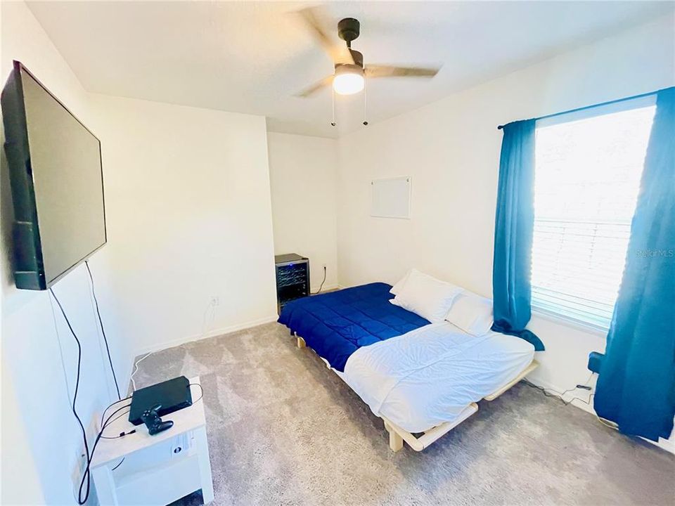 Bedroom #2 with ceiling fan & closet