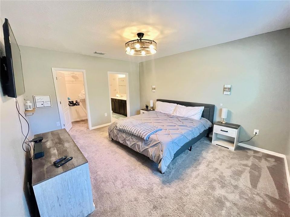 Spacious with ceiling fan, walk-in closet and en suite bathroom