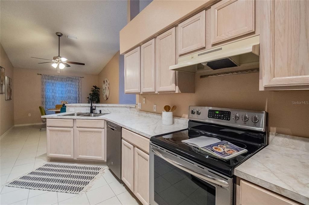 Pristine Kitchen with new conventional oven and hardwood cabinets