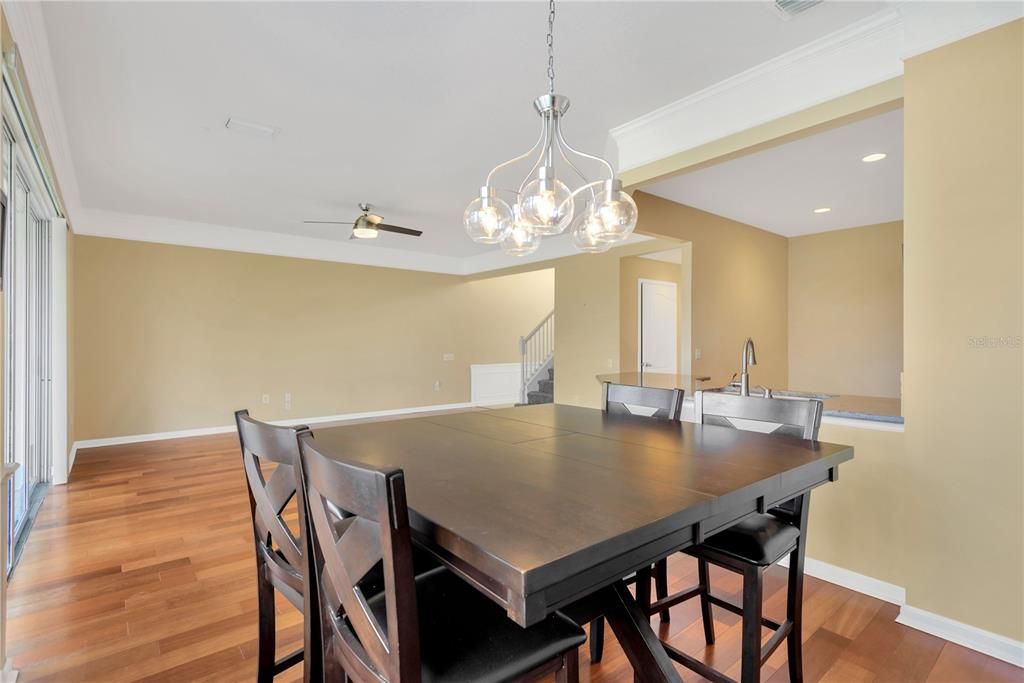 Dining area with access to seating at the breakfast bar which is all one level.