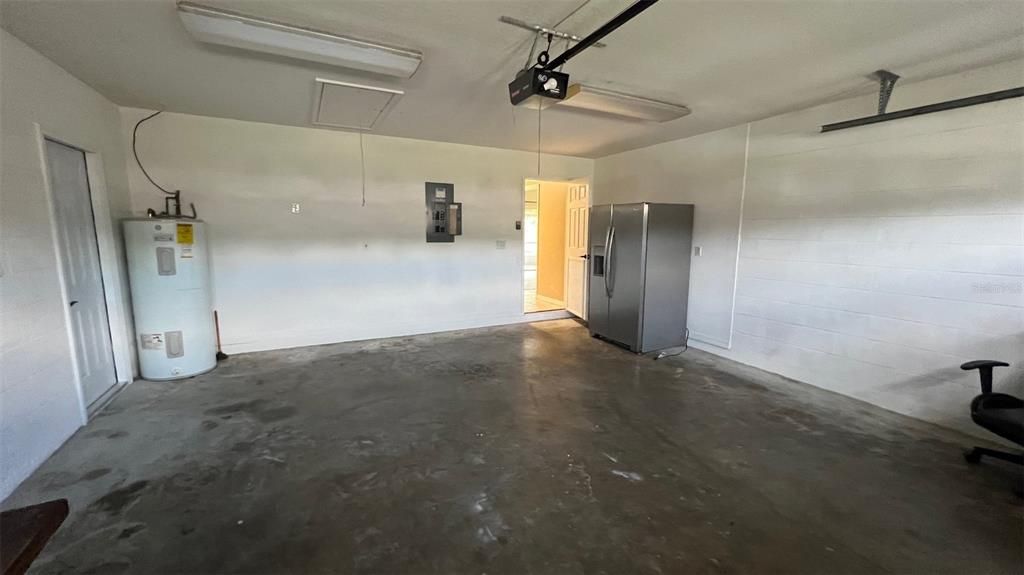 2 car garage with additional refridgerator