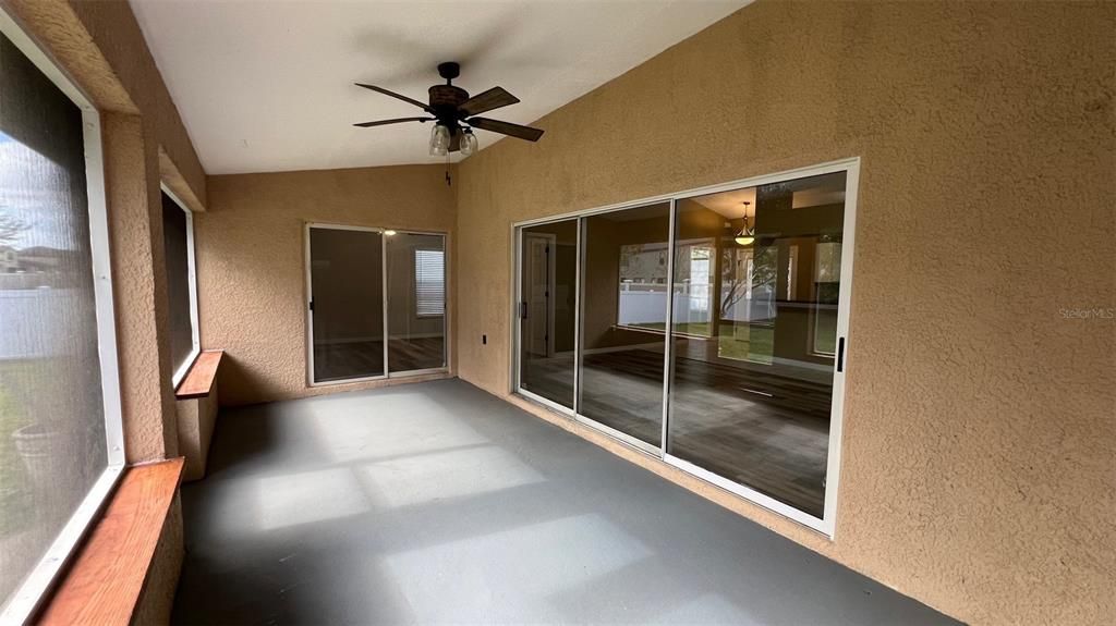 Screened porch with lots of space for outdoor entertaining and living