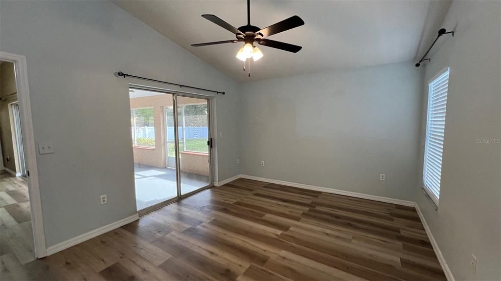 Primary Bedroom with sliding door to porch