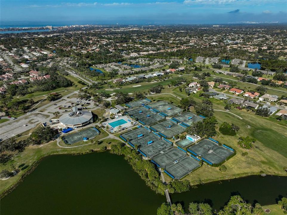 View from above of the Sarasota Sports Club pool & tennis courts