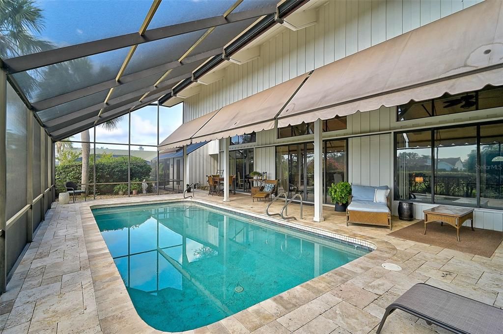 Just beyond the sliding doors, from left to right, are the family, dining, and living rooms