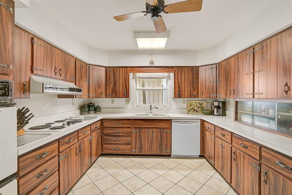 Spacious kitchen, with a window facing the front door area