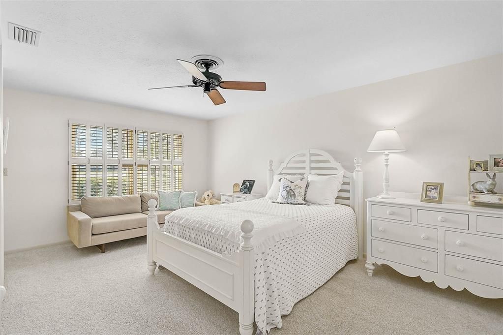 Bedroom 2, with "jack & jill" two closets and two bathrooms between 2nd and 3rd bedrooms! The windows provde a great view of the backyard!