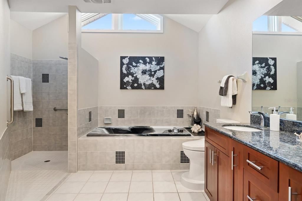 Walk in shower in Primary bedroom is impressive