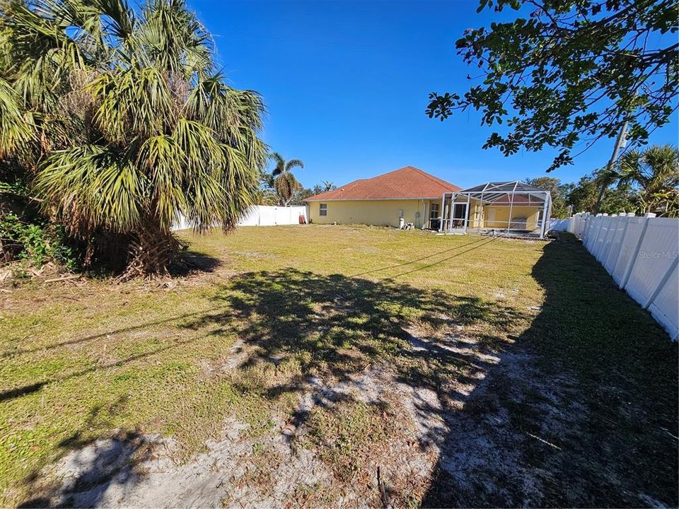 West side, view back towards house.