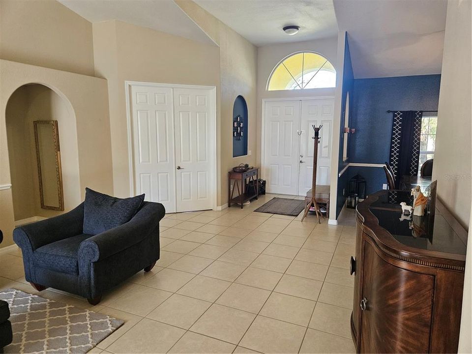 Entryway, Den, Formal Dining and entrance to Master Suite.