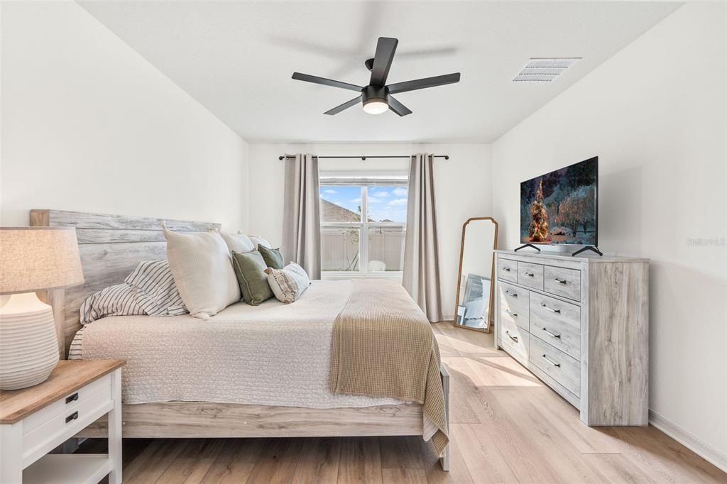 Large Primary Bedroom with Window overlooking Backyard