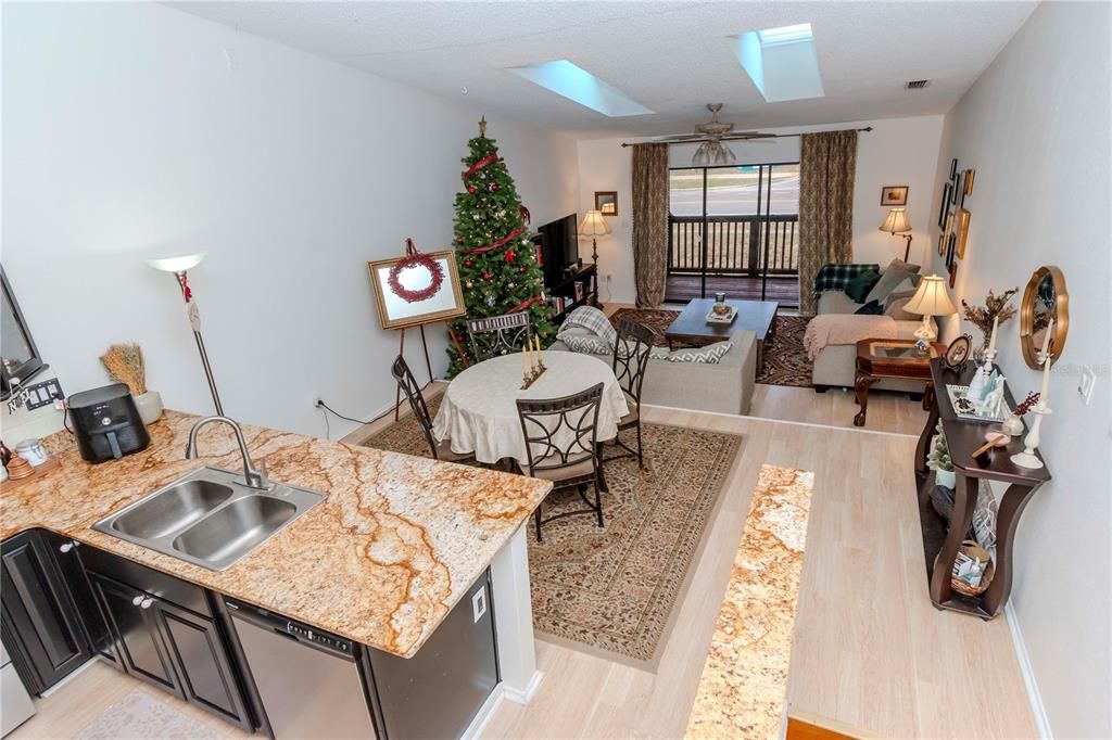 Looking into the main living area from the loft window above.