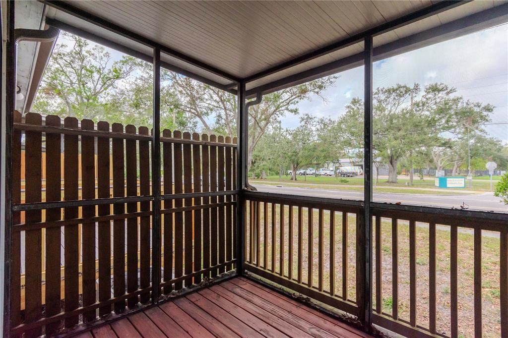 Private screened in patio.