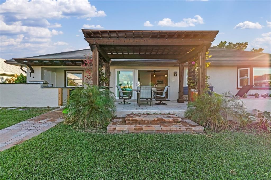 View of Pergola and outdoor entertaining area from dock