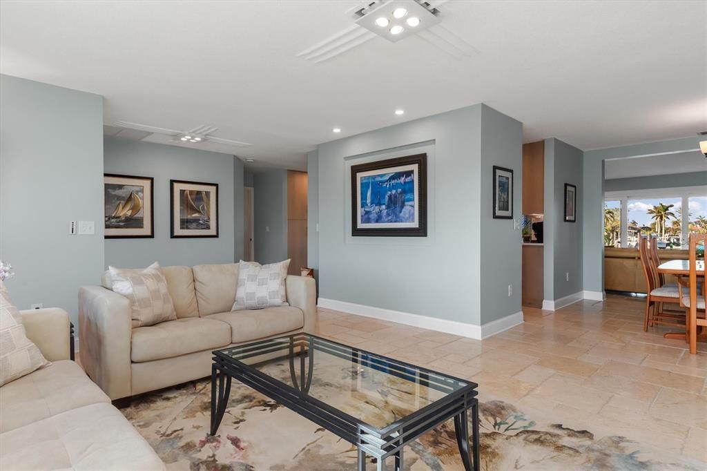 Living Room looking towards front entry, kitchen and Dining Room