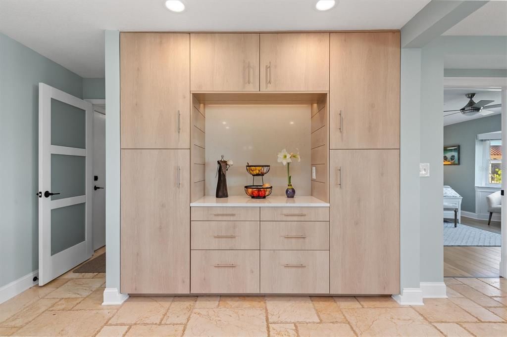 Dry bar and an abundance of storage in Kitchen area