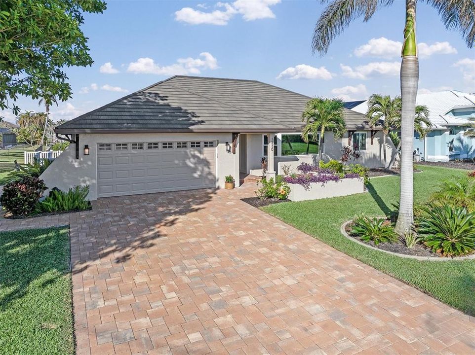 New driveway and walkway pavers, plus upscale interior and exterior lighting