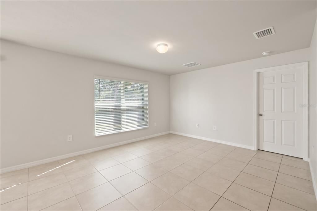 Open floorplan featuring sleek 18” tile flooring throughout.