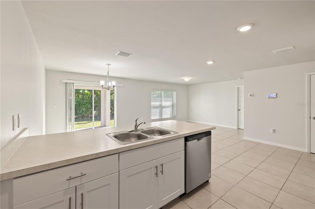 View of kitchen featuring a peninsula island.