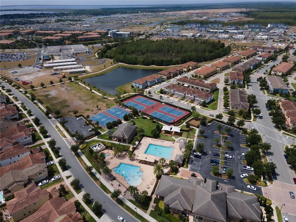 Eagle Creek Community offers amenities such as a Clubhouse, Fitness Center, Gated Community - Guard, Golf Carts OK, Playground, Pool, Restaurant, Tennis Courts and Racketball.